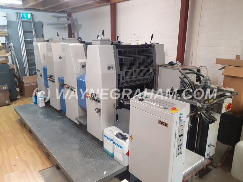 Image of a used Ryobi 524HXX four colour printing press for sale. Equipped with PCS- Off-Press Controls, Ryobimatic Dampening, Technotrans Refrigeration and Recirculation, SAPC, Automatic Blanket Wash, Dry Powder Spray Unit - Year: 2001