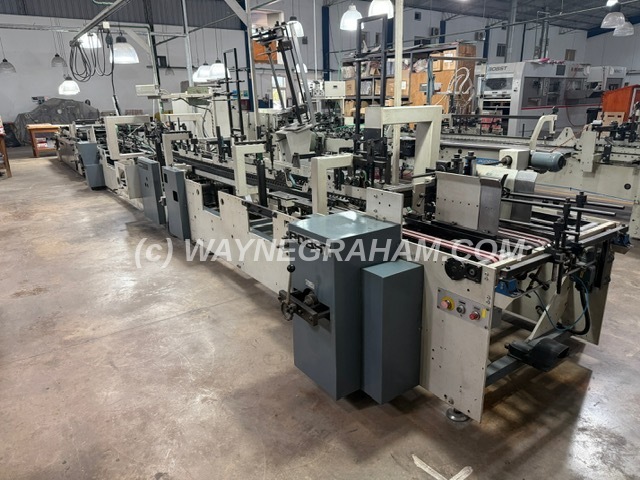 Image of a used Bobst Domino 85 Folding Carton Gluing Line For Sale - Year: 1989 (Fully Refurbished 2013), Equipped with:Maximum Format 850mm:Minmum Format 126mm, Straight Line Gluing, Lock Bottom, Prebreaker Left and Right, Cold Glue Injector System with 3 Guns (2013), Fully Refurbished 2013