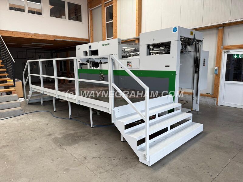 Image of a used Bobst Speria SP 104-E Die Cutting Machine For Sale - Year: 2002 - Equipped with: Maximum Sheet Size 1,040 x 740mm, Stripping Station, CUBE, Micrometric, Non-Stop Feeder, Continuous Delivery, On a 41cm Plinth, Paper and Board 80gsm - 2,000gsm, Corrugated to 4mm, Refurbished 2025 - Repainted. - Ref: 32110