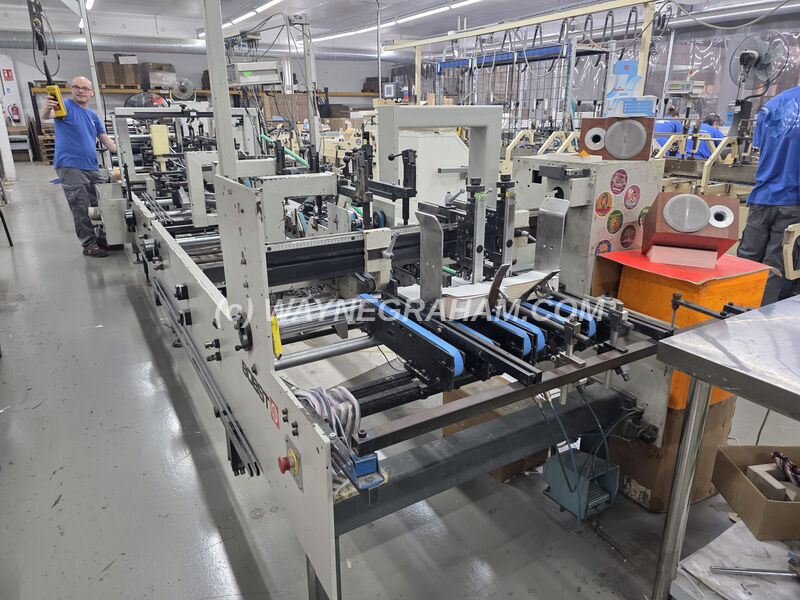 image of a used or pre-owned Bobst Media 100 II A2 Folding Carton Gluing Line for sale - Equipped with: Straightline Gluing, Crash Lock, 3 Glue Guns, New Belts - Year: 2000 - Ref: 32143