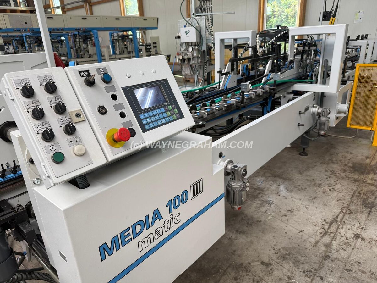 Image of a secondhand or used Bobst Media 100 III A2 Matic Folding Caron Glueing Line For Sale - Year: 2000 Equipped with: Maximum Width 1,000mm, Straight Line, Lock Bottom, Double Wall, 4 and 6 Point Gluing, Fully Automatic Format, Robatec Electronic Upper Glue Unit, Prebreaker Left and Right, CUBE, Camera Monitoring, Small Box Device, Refurbished 2026